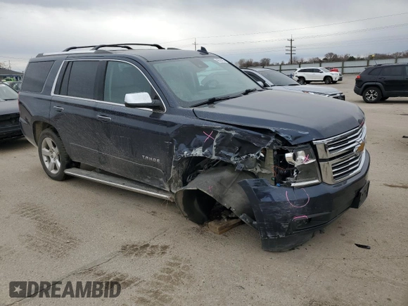 2020 Chevrolet Tahoe Premier with VIN 1GNSKCKC9LR153690, listed as a Copart auction lot 48520425 with 41,418 mi miles and Salvage title. Bid and sale history available at DreamBid. Image 4.