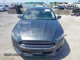 2016 Ford Fusion S z VIN 3FA6P0G78GR239353, wystawiony jako IAAI lot #42078032 z przebiegiem 177 367 mil mil oraz . Historia ofert i sprzedaży dostępna na DreamBid. Obrazek 6.