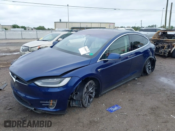 2018 Tesla Model X 75D with VIN 5YJXCAE2XJF111180, listed as a IAAI auction lot 41988079 with 114,593 mi miles and . Bid and sale history available at DreamBid. Image 17.