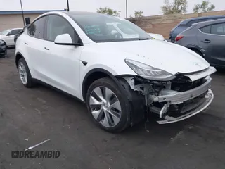 2023 Tesla Model Y Long Range z VIN 7SAYGDEE5PA063097, wystawiony jako IAAI lot #42171871 z przebiegiem Nie podano mil oraz . Historia ofert i sprzedaży dostępna na DreamBid. Obrazek 1.