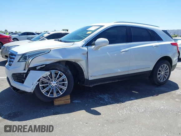 2017 Cadillac XT5 Luxury AWD z VIN 1GYKNDRS8HZ120863, wystawiony jako IAAI lot #42101279 z przebiegiem 100 535 mil mil oraz . Historia ofert i sprzedaży dostępna na DreamBid. Obrazek 6.