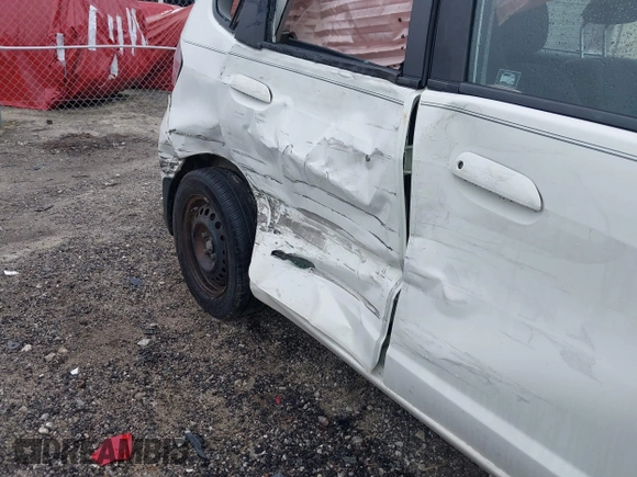 2010 Honda Fit with VIN JHMGE8H23AC009813, listed as a IAAI auction lot 41900735 with 220,000 mi miles. Bid and sale history available at carsss.com. Image 6.