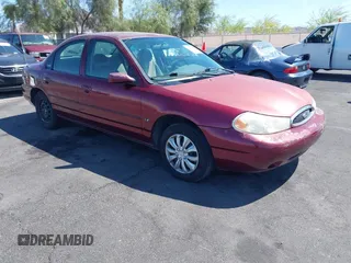 1999 Ford Contour z VIN 1FAFP6538XK117065, wystawiony jako IAAI lot #42088857 z przebiegiem 138 489 mil mil oraz . Historia ofert i sprzedaży dostępna na DreamBid. Obrazek 1.
