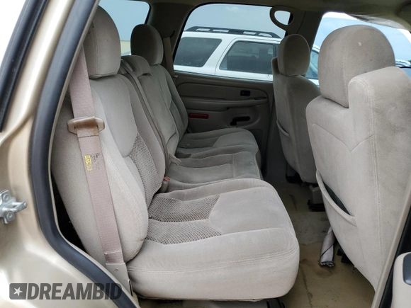 2005 Chevrolet Tahoe Z71 z VIN 1GNEC13T35R120569, wystawiony jako Copart lot #56483585 z przebiegiem 220 860 mil mil oraz Szkoda całkowita • Salvage title. Historia ofert i sprzedaży dostępna na DreamBid. Obrazek 11.