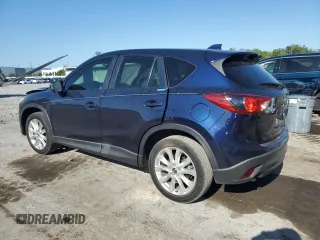 2014 Mazda CX-5 Grand Touring with VIN JM3KE2DY8E0361108, listed as a Copart auction lot 52876965 with 116,135 mi miles and Salvage Title. Bid and sale history available at carsss.com. Image 2.