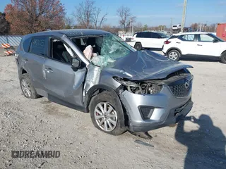 2015 Mazda CX-5 Sport z VIN JM3KE2BE1F0478653, wystawiony jako IAAI lot #41016249 z przebiegiem Nie podano mil oraz . Historia ofert i sprzedaży dostępna na DreamBid. Obrazek 1.