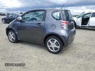2012 Scion iQ z VIN JTNJJXB06CJ009187, wystawiony jako Copart lot #56563665 z przebiegiem 105 014 mil mil oraz Szkoda całkowita • Salvage title. Historia ofert i sprzedaży dostępna na DreamBid. Obrazek 2.