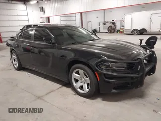 2022 Dodge Charger Police with VIN 2C3CDXAT6NH110044, listed as a IAAI auction lot 41292387 with 59,324 mi miles and . Bid and sale history available at DreamBid. Image 1.