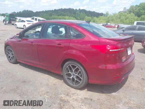 2015 Ford Focus SE z VIN 1FADP3F25FL313033, wystawiony jako IAAI lot #42206507 z przebiegiem 142 938 mil mil oraz . Historia ofert i sprzedaży dostępna na DreamBid. Obrazek 3.