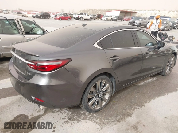 2020 Mazda 6 Signature with VIN JM1GL1XY6L1522900, listed as a IAAI auction lot 41724818 with 62,846 mi miles and . Bid and sale history available at DreamBid. Image 4.