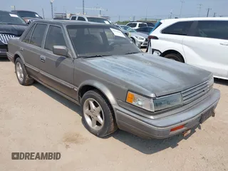 1988 Nissan Maxima with VIN JN1HU11P5JT608141, listed as a IAAI auction lot 42274299 with 214,277 mi miles and . Bid and sale history available at DreamBid. Image 1.