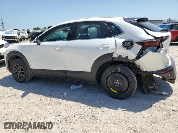 2023 Mazda CX-30 S with VIN 3MVDMBAM3PM575394, listed as a Copart auction lot 52531455 with 51,155 mi miles and Salvage title. Bid and sale history available at DreamBid. Image 2.