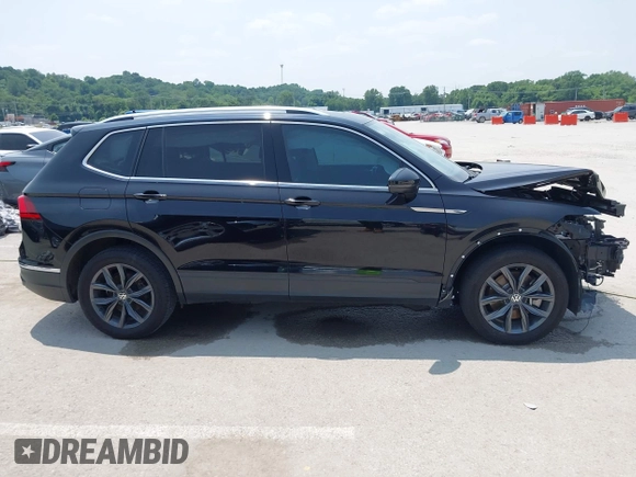 2023 Volkswagen Tiguan SE with VIN 3VVNB7AX5PM017938, listed as a IAAI auction lot 42453818 with 177,906 mi miles and . Bid and sale history available at DreamBid. Image 14.