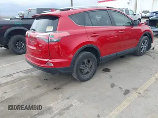 2017 Toyota RAV4 LE with VIN JTMZFREV1HJ125822, listed as a IAAI auction lot 41763849 with 91,429 mi miles and . Bid and sale history available at carsss.com. Image 4.