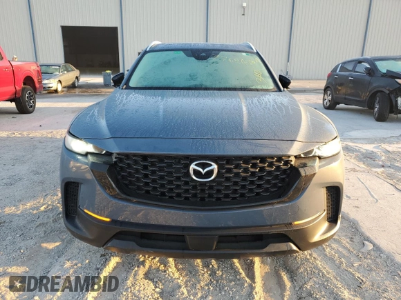 2023 Mazda CX-50 S Premium Plus with VIN 7MMVABEM3PN102285, listed as a Copart auction lot 77684064 with 14,190 mi miles and Salvage Title. Bid and sale history available at DreamBid. Image 5.