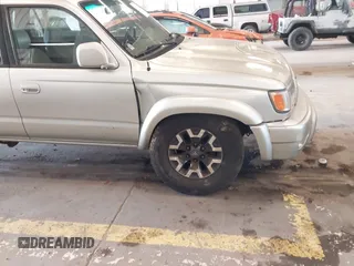 2000 Toyota 4Runner SR5 z VIN JT3HN86R6Y0294870, wystawiony jako IAAI lot #42131835 z przebiegiem 292 259 mil mil oraz . Historia ofert i sprzedaży dostępna na DreamBid. Obrazek 12.