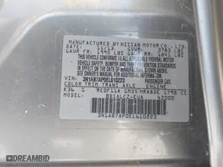 2014 Nissan Sentra SR with VIN 3N1AB7AP0EL610223, listed as a IAAI auction lot 42083670 with 140,808 mi miles. Bid and sale history available at carsss.com. Image 9.