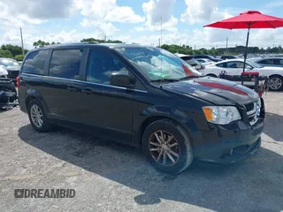 2019 Dodge Grand Caravan SXT with VIN 2C4RDGCG5KR797853, listed as a IAAI auction lot 40332854 with 81,197 mi miles and . Bid and sale history available at DreamBid. Image 1.