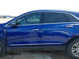 2023 Cadillac XT5 FWD Premium Luxury with VIN 1GYKNCRS4PZ151486, listed as a IAAI auction lot 42099826 with 42,274 mi miles and . Bid and sale history available at DreamBid. Image 14.