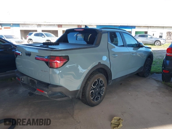 2022 Hyundai Santa Cruz SEL Premium z VIN 5NTJDDAF3NH012433, wystawiony jako IAAI lot #41922462 z przebiegiem 72 880 mil mil oraz . Historia ofert i sprzedaży dostępna na DreamBid. Obrazek 4.
