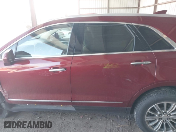 2017 Cadillac XT5 Luxury AWD with VIN 1GYKNDRS5HZ265570, listed as a IAAI auction lot 41915115 with 96,493 mi miles and . Bid and sale history available at DreamBid. Image 14.
