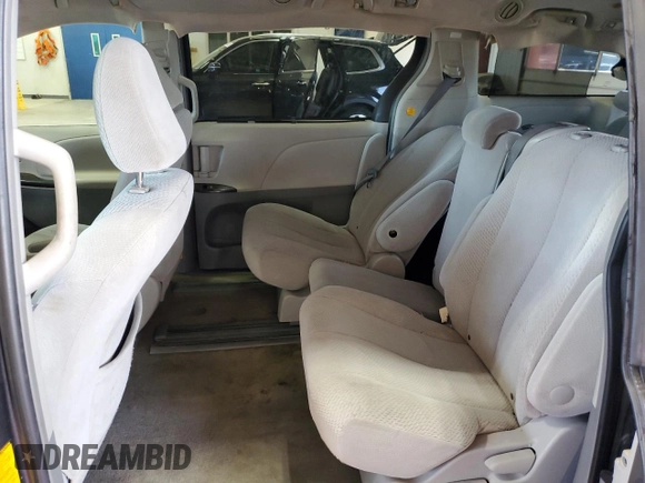 2011 Toyota Sienna LE AAS with VIN 5TDKK3DC8BS117009, listed as a Copart auction lot 56035065 with 148,160 mi miles and Salvage Title. Bid and sale history available at DreamBid. Image 11.