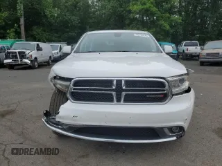 2014 Dodge Durango SXT with VIN 1C4RDJAG4EC323423, listed as a Copart auction lot 60159145 with 160,022 mi miles and Salvage title. Bid and sale history available at DreamBid. Image 5.