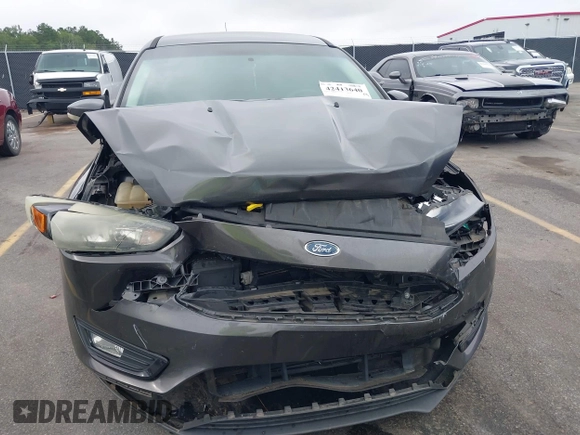 2016 Ford Focus SE with VIN 1FADP3FE9GL232502, listed as a IAAI auction lot 42413640 with 115,953 mi miles and . Bid and sale history available at DreamBid. Image 6.