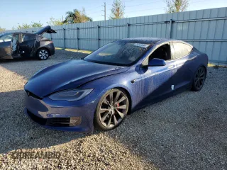 2020 Tesla Model S Performance with VIN 5YJSA1E40LF389106, listed as a Copart auction lot 74157584 with Not provided miles and Salvage title. Bid and sale history available at DreamBid. Image 1.