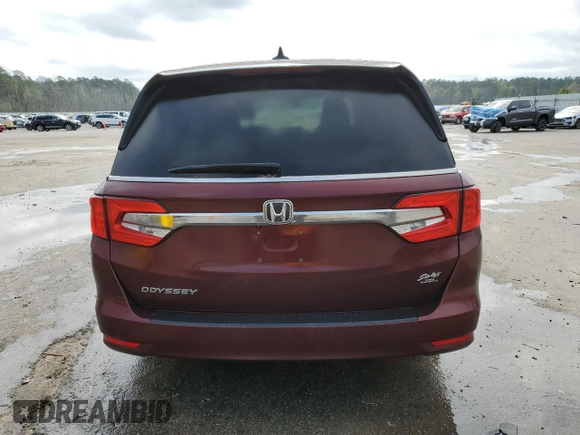 2018 Honda Odyssey EX-L z VIN 5FNRL6H75JB097041, wystawiony jako Copart lot #50617535 z przebiegiem 169 040 mil mil oraz Szkoda całkowita • Salvage title. Historia ofert i sprzedaży dostępna na DreamBid. Obrazek 6.