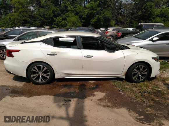 2017 Nissan Maxima SV z VIN 1N4AA6AP7HC424842, wystawiony jako IAAI lot #42452522 z przebiegiem 181 327 mil mil oraz . Historia ofert i sprzedaży dostępna na DreamBid. Obrazek 13.