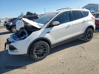 2015 Ford Escape Titanium with VIN 1FMCU9J91FUA09435, listed as a Copart auction lot 44803285 with 130,209 mi miles and Salvage title. Bid and sale history available at DreamBid. Image 1.