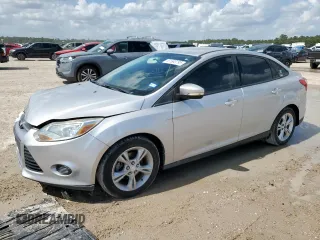 2013 Ford Focus SE with VIN 1FADP3F22DL263124, listed as a Copart auction lot 61583795 with 133,522 mi miles and Salvage title. Bid and sale history available at DreamBid. Image 1.