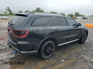 2014 Dodge Durango Citadel с VIN 1C4SDJET3EC361282, выставлен на аукционе Copart как лот 56781505 с пробегом 163 641 миль миль и Списание • Salvage title. История ставок и продаж доступна на DreamBid. Изображение 3.