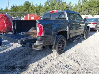 2019 GMC Canyon 2WD SLE with VIN 1GTG5CEN2K1355982, listed as a IAAI auction lot 41931708 with 70,780 mi miles. Bid and sale history available at carsss.com. Image 4.