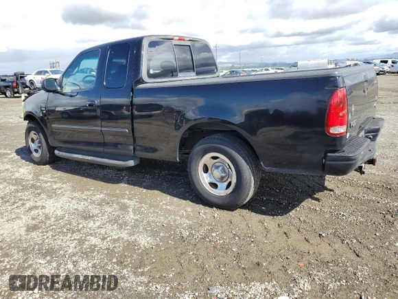 2001 Ford F-150 XL with VIN 1FTRX17W91NB71630, listed as a Copart auction lot 56583545 with 209,009 mi miles and Salvage title. Bid and sale history available at DreamBid. Image 2.