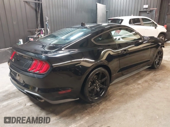 2020 Ford Mustang EcoBoost z VIN 1FA6P8TH6L5145109, wystawiony jako IAAI lot #42301649 z przebiegiem 48 622 mil mil oraz . Historia ofert i sprzedaży dostępna na DreamBid. Obrazek 4.
