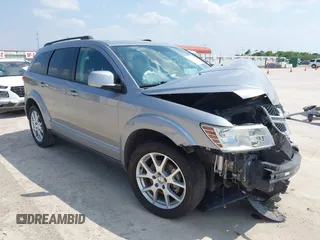 2015 Dodge Journey SXT with VIN 3C4PDCBG4FT712960, listed as a IAAI auction lot 42347269 with 134,991 mi miles and . Bid and sale history available at DreamBid. Image 1.