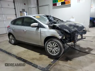 2017 Ford Focus Titanium с VIN 1FADP3N20HL274033, выставлен на аукционе Copart как лот 57295925 с пробегом Не указан миль и Списание • Salvage title. История ставок и продаж доступна на DreamBid. Изображение 4.