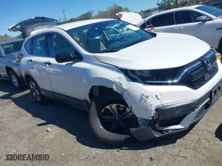 2020 Honda CR-V LX with VIN 2HKRW2H2XLH633684, listed as a IAAI auction lot 41856678 with 64,914 mi miles. Bid and sale history available at carsss.com. Image 1.