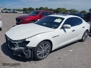 2015 Maserati Ghibli with VIN ZAM57XSA7F1155160, listed as a IAAI auction lot 41749868 with 107,304 mi miles. Bid and sale history available at carsss.com. Image 2.