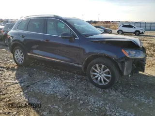 2012 Volkswagen Touareg Sport с VIN WVGEK9BP6CD009633, выставлен на аукционе Copart как лот 85475414 с пробегом 139 872 миль миль и Списание • Salvage title. История ставок и продаж доступна на DreamBid. Изображение 4.