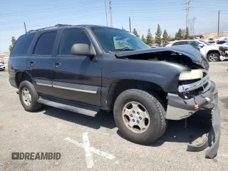 2005 Chevrolet Tahoe LS with VIN 1GNEC13VX5R115306, listed as a Copart auction lot 62836105 with 150,716 mi miles and Salvage title. Bid and sale history available at DreamBid. Image 4.