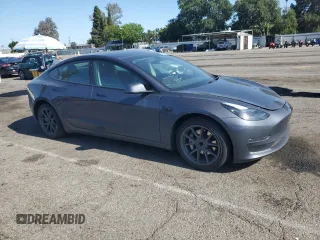 2023 Tesla Model 3 с VIN 5YJ3E1EAXPF607931, выставлен на аукционе Copart как лот 52629305 с пробегом 87 785 миль миль и Списание • Salvage title. История ставок и продаж доступна на DreamBid. Изображение 4.
