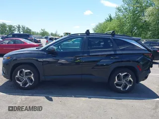 2022 Hyundai Tucson SEL z VIN 5NMJFCAE5NH046879, wystawiony jako IAAI lot #42295125 z przebiegiem 24 448 mil mil oraz . Historia ofert i sprzedaży dostępna na DreamBid. Obrazek 14.