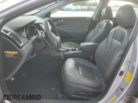 2012 Hyundai Sonata Limited z VIN 5NPEC4AB4CH455218, wystawiony jako Copart lot #60414585 z przebiegiem 195 817 mil mil oraz Szkoda całkowita • Salvage title. Historia ofert i sprzedaży dostępna na DreamBid. Obrazek 7.