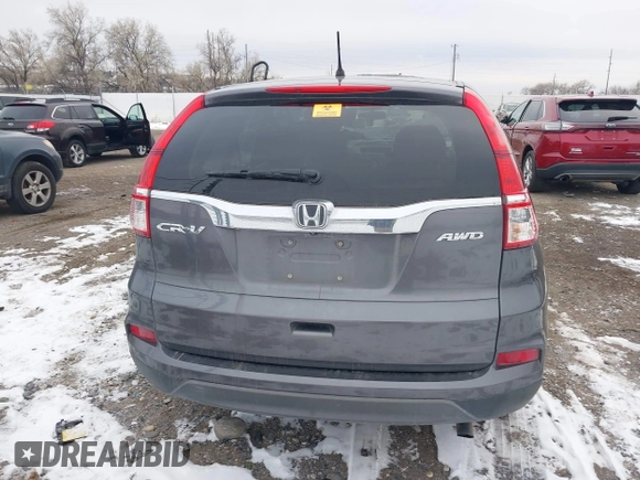 2015 Honda CR-V LX with VIN 2HKRM4H3XFH619055, listed as a IAAI auction lot 40989227 with 113,332 mi miles and . Bid and sale history available at DreamBid. Image 16.