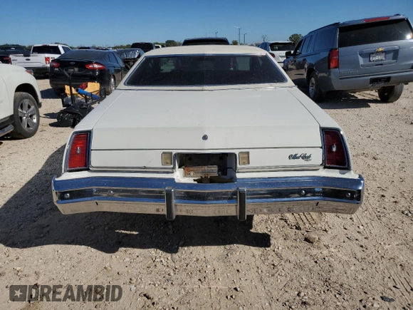 1974 Chevrolet Monte Carlo z VIN 1H57H4R75663, wystawiony jako Copart lot #81492924 z przebiegiem 90 431 mil mil oraz Tytuł czysty. Historia ofert i sprzedaży dostępna na DreamBid. Obrazek 7.