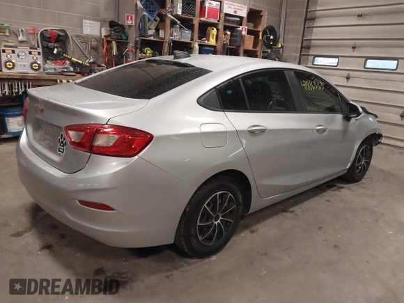 2018 Chevrolet Cruze LS with VIN 1G1BC5SM5J7228803, listed as a IAAI auction lot 41816363 with 101,311 mi miles and . Bid and sale history available at DreamBid. Image 4.