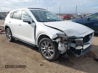 2019 Mazda CX-5 Grand Touring with VIN JM3KFBDM8K0518576, listed as a IAAI auction lot 41854296 with 88,706 mi miles and . Bid and sale history available at carsss.com. Image 1.